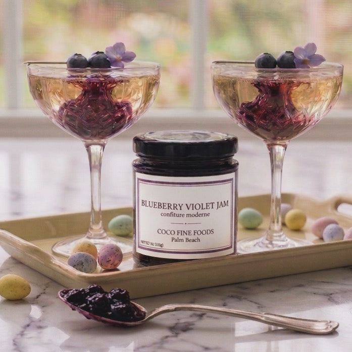 Blueberry Violet Jam Cocktail. Blueberry Violet Jam swirled into a glass of prosecco